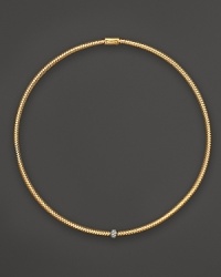 A single diamond station shines on this 18K gold mesh necklace from Roberto Coin. A single diamond station shines on this 18K gold mesh necklace from Roberto Coin.