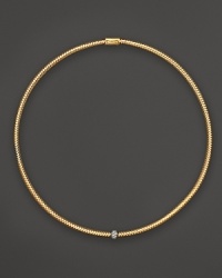 A single diamond station shines on this 18K gold mesh necklace from Roberto Coin.