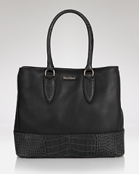 Day bags don't come easier than this subtly embossed style from Max Mara. Crafted from ultra-soft leather and and designed to fit perfectly over the shoulder, it's our favorite way to carry on. Day bags don't come easier than this subtly embossed style from Max Mara. Crafted from ultra-soft leather and and designed to fit perfectly over the shoulder, it's our favorite way to carry on.