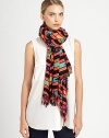 Wearable art takes a new form on this lightweight scarf adorned with a vibrant, tribal-inspired print and allover fringe trim.Viscose44 X 78Hand washImported