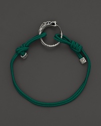 Eastern elements inform John Hardy's dragon head bracelet. It features a cotton cord band with an adjustable sliding closure. Eastern elements inform John Hardy's dragon head bracelet. It features a cotton cord band with an adjustable sliding closure.