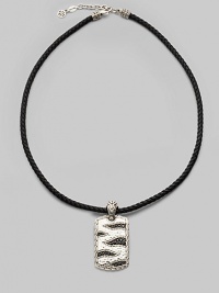 A military-inspired look with two versatile options: a carved tiger motif on one side and sapphire-embellished tiger stripes on the other. From the Macan Collection Sterling silver Leather Sapphires, 0.94 tcw Cord, about 18 long Imported A military-inspired look with two versatile options: a carved tiger motif on one side and sapphire-embellished tiger stripes on the other. From the Macan Collection Sterling silver Leather Sapphires, 0.94 tcw Cord, about 18 long Imported