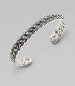 A bold accent crafted in sterling silver with a woven design that lends immediate texture. Sterling silver0.375 wideImported