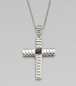 A polished cross pendant is suspended from a chain necklace, both crafted in sterling silver.From the Bedeg CollectionSterling silverPendant, 1¼W x 1½HNecklace, 24 lengthImported