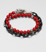 This chain link and beaded, multi-row design of stainless steel and sterling silver is embellished with red coral for a colorful, charismatic touch.Stainless steel/sterling silverCoralAbout 3 diam.Imported