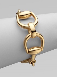From the Horsebit Collection. A stunning piece that features a horsebit motif in radiant 18k gold. 18k goldHinged clasp closureLength, about 7Made in Italy