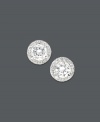 Traditional diamond earrings with an extra touch of sparkle. Round-cut diamonds are encircled by a halo of round-cut diamonds (1 ct. t.w.). Set in 14k white gold. Approximate diameter: 5 mm.