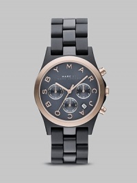 A beautiful dual tone timepiece in light, modern aluminum. Quartz movement Water resistant to 5 ATM Round gray aluminum case, 40mm (1.6) Smooth bezel Grey dial Logo markers Date display between 4 and 5 o'clock Second hand Gray aluminum link bracelet, 20mm wide (0.8) Imported A beautiful dual tone timepiece in light, modern aluminum. Quartz movement Water resistant to 5 ATM Round gray aluminum case, 40mm (1.6) Smooth bezel Grey dial Logo markers Date display between 4 and 5 o'clock Second hand Gray aluminum link bracelet, 20mm wide (0.8) Imported