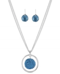 Feeling the blue. Kenneth Cole New York puts you in a good mood with this pendant and drop earrings set. The necklace is crafted from silver-tone mixed metal with a blue glitter disc in the pendant and a pair of drop earrings to match. Items come packaged in a signature Kenneth Cole New York Gift Box. Approximate length: 16 inches + 3-inch extender. Approximate pendant drop: 1-1/2 inches. Approximate earrings drop: 3/4 inch. Feeling the blue. Kenneth Cole New York puts you in a good mood with this pendant and drop earrings set. The necklace is crafted from silver-tone mixed metal with a blue glitter disc in the pendant and a pair of drop earrings to match. Items come packaged in a signature Kenneth Cole New York Gift Box. Approximate length: 16 inches + 3-inch extender. Approximate pendant drop: 1-1/2 inches. Approximate earrings drop: 3/4 inch.