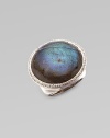 A stunning piece with large labradorite cabochon surrounded by dazzling diamonds. Diamonds, 0.62 tcwLabradorite Sterling silver Width, about 1Imported 