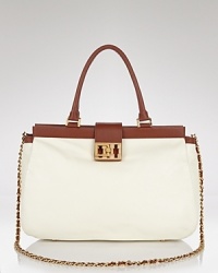 Tory Burch's leather satchel boasts the label's signature Park Avenue polish. Ideal for work or weekend brunches, this bag can handle the essentials with flair. Tory Burch's leather satchel boasts the label's signature Park Avenue polish. Ideal for work or weekend brunches, this bag can handle the essentials with flair.