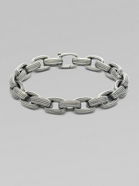 A handsome linked design, intricately textured in sterling silver. From the Royal Cord Collection Sterling silver Clasp closure About 8½ long Imported A handsome linked design, intricately textured in sterling silver. From the Royal Cord Collection Sterling silver Clasp closure About 8½ long Imported