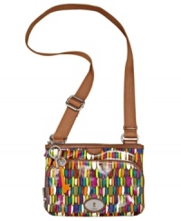 Add some fun to your style! Offered in a number of eye-catching prints, this Fossil top zip expresses your individuality while providing everyday functionality. A colorful signature charm completes the look. Add some fun to your style! Offered in a number of eye-catching prints, this Fossil top zip expresses your individuality while providing everyday functionality. A colorful signature charm completes the look.
