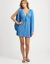 From its shoulders with ultra-feminine ruching to its deep v-neckline, a coverup that is as pretty as it is comfortable.V-neckSplit sleevesPull-on styleEmpire drawstring waistFully linedAbout 21 from natural waist96% modal/4% elastaneDry cleanImported of Italian fabric
