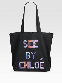 A quirky canvas style with a patchwork logo front.Double shoulder straps, 10 dropOpen top14½W X 11H X 4DImported A quirky canvas style with a patchwork logo front.Double shoulder straps, 10 dropOpen top14½W X 11H X 4DImported