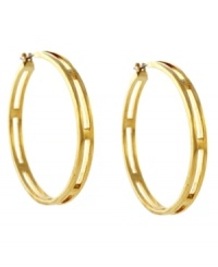 Architecturally sound. Vince Camuto takes a traditional hoop earring and adds subtle, structured details with a unique open-cut design. Set in gold tone mixed metal. Approximate diameter: 3-3/4 inches.