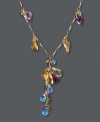 Accentuate your neckline with a dazzling rainbow of color. Effy Collection's stunning y-shaped necklace features a plentiful array of gemstones including lemon quartz (11-1/3 ct. t.w.), amethyst (9-9/10 ct. t.w.), citrine (14 ct. t.w.), blue topaz (13-3/8 ct. t.w.), tourmaline (9-1/10 ct. t.w.), garnet (9/10 ct. t.w.) and peridot (5/8 ct. t.w.). Set in 14k gold. Approximate length: 16 inches. Approximate drop: 2 inches.