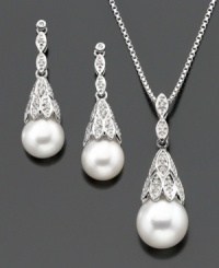Luminous cultured freshwater pearl (7.5-9 mm) emerges from sparkling diamond-accented settings on this beautiful sterling silver jewelry set. Pendant measures approximately 18 inches with a 1-inch drop. Earrings measure approximately 1 inch. Luminous cultured freshwater pearl (7.5-9 mm) emerges from sparkling diamond-accented settings on this beautiful sterling silver jewelry set. Pendant measures approximately 18 inches with a 1-inch drop. Earrings measure approximately 1 inch.