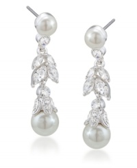 Feminine and fanciful. Add a ladylike look to your style with Carolee's floral linear drop earrings. Featuring luminous glass pearls and glittering glass accents, they're set in silver tone mixed metal. Approximate drop: 1-3/8 inches. Feminine and fanciful. Add a ladylike look to your style with Carolee's floral linear drop earrings. Featuring luminous glass pearls and glittering glass accents, they're set in silver tone mixed metal. Approximate drop: 1-3/8 inches.