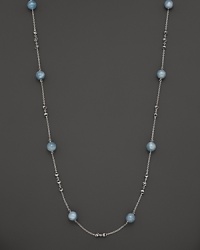 This sterling silver necklace, gleaming with aquamarine, makes an elegant statement. By Di MODOLO. This sterling silver necklace, gleaming with aquamarine, makes an elegant statement. By Di MODOLO.
