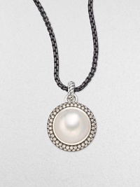 From the Mooonlight Ice Collection. A lustrous white mabe pearl sits center with a dazzling, two-row diamond surround. White mabe pearlDiamonds, 1.36 tcwBlackened sterling silverSize, about ½Imported Please note: Chain sold separately. From the Mooonlight Ice Collection. A lustrous white mabe pearl sits center with a dazzling, two-row diamond surround. White mabe pearlDiamonds, 1.36 tcwBlackened sterling silverSize, about ½Imported Please note: Chain sold separately.