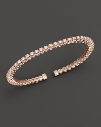 Dazzling diamonds, set in 14K pink gold, make the perfect bracelet for stacking. Dazzling diamonds, set in 14K pink gold, make the perfect bracelet for stacking.