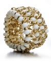 Bright pops of white lend a fresh, clean touch to any look. Style&co.'s stretch bracelet features white glass beads in an intricately-woven gold tone mixed metal setting. Approximate length: 7 inches.