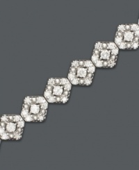 A classic diamond tennis bracelet takes on an interesting new shape with the incorporation of hexagon-shaped links. Crafted in 14k white gold, bracelet features glittering round-cut diamond (2 ct. t.w.). Approximate length: 7-1/4 inches. A classic diamond tennis bracelet takes on an interesting new shape with the incorporation of hexagon-shaped links. Crafted in 14k white gold, bracelet features glittering round-cut diamond (2 ct. t.w.). Approximate length: 7-1/4 inches.