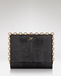 The power clutch is the bag we want now, and this embossed leather style from DIANE von FURSTENBERG is an exotic take on the trend, detailed by a pushlock closure. The power clutch is the bag we want now, and this embossed leather style from DIANE von FURSTENBERG is an exotic take on the trend, detailed by a pushlock closure.