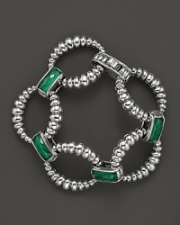 Malachite doubles connect fluted sterling silver loops on this link bracelet from Lagos. Malachite doubles connect fluted sterling silver loops on this link bracelet from Lagos.