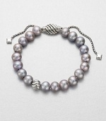 From the Spiritual Bead Collection. Luminous grey freshwater pearls on a sterling silver box chain with sterling silver cabled bead accents. 8mm grey freshwater pearlsSterling silverDiameter, about 7.75 adjustableBead closureImported 