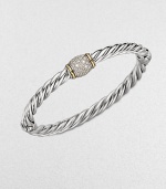 From the Metro Collection. A sleek, iconic cabled bangle embellished with brilliant pavé diamonds accented in radiant 18k gold. Sterling silver18k goldDiamonds, .41 tcwDiameter, about 2.5Hinged, push clasp closureImported 