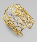 From the Elements Collection. A pretty crystal accented cuff with elegant woven leaves. Swarovski crystalsGoldtoneRhodium-platedLength, about 6½ adjustableSlip-on styleImported