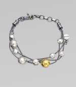 From the Lentil Collection. Strands of blackened sterling silver are stationed with hammered metal circles for an artsy finish.24K yellow gold Sterling silver Adjustable bracelet diameter, about 7-8 Lobster clasp Imported