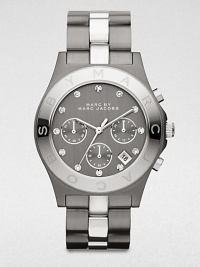 A technical, two-tone stainless steel timepiece with brilliant rhinestone markers. Quartz movementWater resistant to 5 ATMRound gunmetal ion-plated stainless steel case, 40mm (1.6)Logo engraved silvertone ion-plated bezelGunmetal chronograph dialRhinestone hour markersDate display between 4 and 5 o'clockSecond hand Two-tone stainless steel link braceletImported A technical, two-tone stainless steel timepiece with brilliant rhinestone markers. Quartz movementWater resistant to 5 ATMRound gunmetal ion-plated stainless steel case, 40mm (1.6)Logo engraved silvertone ion-plated bezelGunmetal chronograph dialRhinestone hour markersDate display between 4 and 5 o'clockSecond hand Two-tone stainless steel link braceletImported
