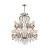 Glamour radiates from this dramatic Ralph Lauren chandelabra, featuring twenty four bulbs topped with petite silk shades and draped with dazzling crystals.