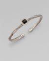 From the Noblesse Collection. Shimmering pavé diamonds frame a faceted black onyx stone, delicately perched atop a cabled silver cuff. Diamonds, 0.14 tcw Black onyx Sterling silver Cable, 5mm Diameter, about 2¼ Made in USA