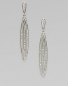 EXCLUSIVELY AT SAKS. A stunning style featuring an elongated oval accented with brilliant pavé crystals. CrystalsRhodium-plated brassDrop, about 2½Post backImported 