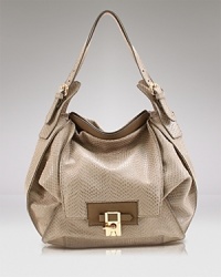 Kooba's slouchy leather shoulder bag raises the sartorial bar: it holds all the daytime essentials yet still manages to look chic under your arm. Kooba's slouchy leather shoulder bag raises the sartorial bar: it holds all the daytime essentials yet still manages to look chic under your arm.