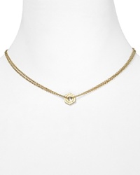 Pair this tiny MARC BY MARC JACOBS pendant necklace with one or two other necklaces for a lovely, layered look.