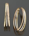 A trio of 14k white, yellow and rose gold bands with pretty textured detail combine for a new look in hoop earrings.