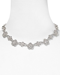 Nix the minimalism and opt for a statement piece like this sterling silver and crystal necklace from Nadri. It's camellia shaped stations lend opulent glamour to occasion looks. Nix the minimalism and opt for a statement piece like this sterling silver and crystal necklace from Nadri. It's camellia shaped stations lend opulent glamour to occasion looks.