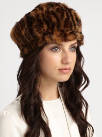 A brimless style in a dyed animal print. Dry clean Imported Fur origin: Spain A brimless style in a dyed animal print. Dry clean Imported Fur origin: Spain