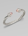 From the Classic Cable Collection. A feminine take on an iconic design with rose quartz and brilliant diamonds. Rose quartzDiamonds, .48 tcwSterling silverDiameter, about 2.5Slip-on styleImported 