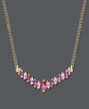Adorn your neckline with an elegant v-shaped pendant. Necklace features marquise-cut rubies (1-1/10 ct. t.w.) and diamonds (1/5 ct. t.w.) set in 14k gold. Approximate length: 16 inches. Approximate pendant width: 2 inches.