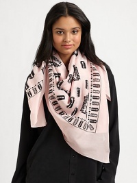 A sharp style with an iconic, razor blade print with a solid border. 70% cotton/30% silkAbout 47 X 46Dry cleanImported A sharp style with an iconic, razor blade print with a solid border. 70% cotton/30% silkAbout 47 X 46Dry cleanImported