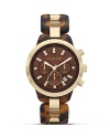 Tap this season's tortoise shell trend with this watch from MICHAEL Michael Kors. It's tonal face and bold bracelet perfect jet set chic, so wear it to give looks first class attitude.