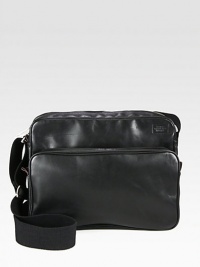 Inspired by a vintage journalist bag, this sleek leather messenger has interior pockets for just about anything, ranging from smart phones to notebooks to camera lenses.Zip closureAdjustable shoulder strapExterior zip, interior slip pocketsLeather15W x 11H x 3DImported Inspired by a vintage journalist bag, this sleek leather messenger has interior pockets for just about anything, ranging from smart phones to notebooks to camera lenses.Zip closureAdjustable shoulder strapExterior zip, interior slip pocketsLeather15W x 11H x 3DImported