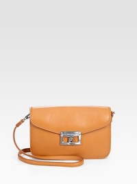 Subtle pebble grain leather in a petite flap bag that can be worn as a crossbody or shoulder bag.Detachable shoulder/crossbody strap, 22 drop Turnlock flap closure Six inside card slots Acetate lining 7½W X 5H X 1D ImportedPlease note: Hardware may differ. Subtle pebble grain leather in a petite flap bag that can be worn as a crossbody or shoulder bag.Detachable shoulder/crossbody strap, 22 drop Turnlock flap closure Six inside card slots Acetate lining 7½W X 5H X 1D ImportedPlease note: Hardware may differ.