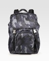 Tessuto nylon backpack with camo print detail and adjustable shoulder straps for maximum comfort.Drawstring, buckle closureTop handleExterior, interior zip pocketsNylon10W x 18H x 7DMade in Italy